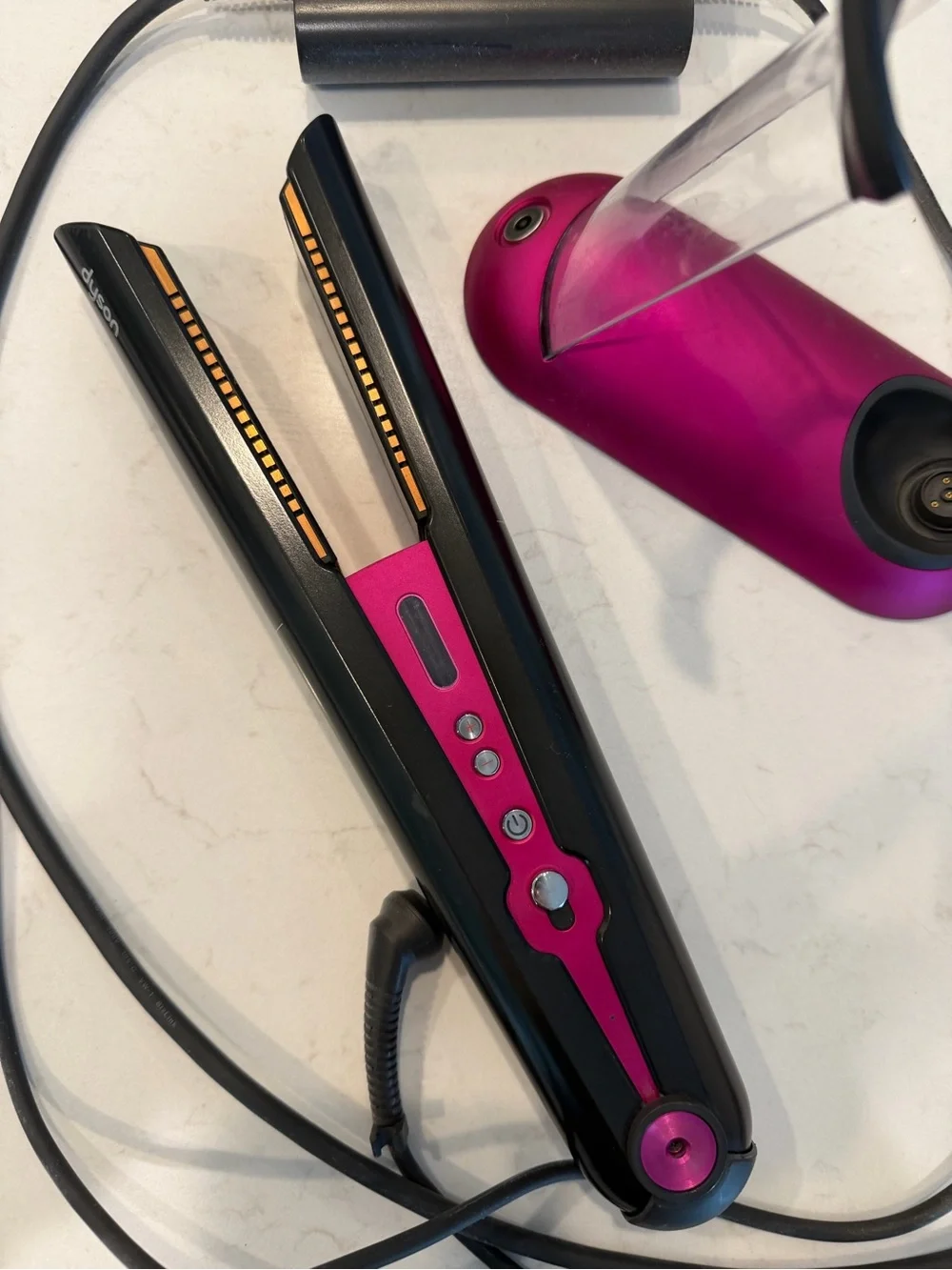 Dyson hair straightener in black and pink